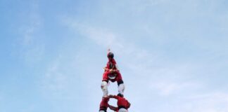 Castells de set dels Xicots en la seva visita a Olesa de Montserrat